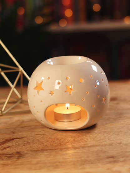 Keramieken oliebrander met sterrenpatroon — voor essentiële oliën, magickal blends & ambiance.